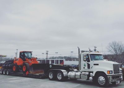 crawler on a flatbed